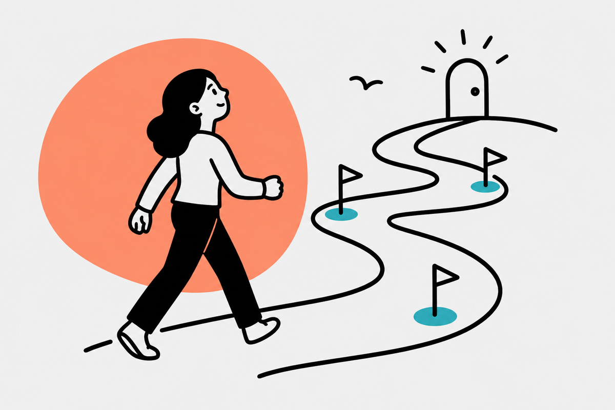 Illustration of a designer walking a winding path toward a first role
